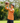 Texas Gameday Polo on a male model with greenery in the background