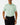 Tucked in Front of the Real Dill Polo on a model in front of a light gray background.