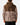 Back of the Timber Zenith Zip Hoodie on a model in front of a light gray background.