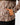 Close up on one of the Zippered pockets on the Timber Zenith Zip Hoodie on a model in front of a light gray background.