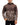 Man wearing a brown and camouflage patterned jacket on a white background