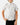 Front of the Traveler Outpost Button-Down Shirt on a model in front of a light gray background.