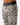 Close up on the elastic waistband on the Treed It Thermal Base Layer Pants on a model in front of a light gray background.