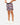 Front 3/4 of the Up North Shoreline Short revealing the elastic waistband and drawstring on a model in front of a light gray background.