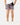 Back of the Up North Shoreline Short on a model in front of a light gray background.
