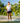 Female model wearing the WWR T-Shirt mini golfing with greenery in the background