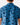 Close up on the back ventilation on the Wake Life Outpost Button-Down Shirt on a model in front of a light gray background.