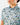 Collar on the Want S'More Polo on a model in front of a light gray background.