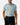 Front of the Want S'More Polo tucked in on a model in front of a light gray background.