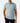 Front of the Want S'More Polo on a model in front of a light gray background.