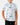 Untucked Front of the Water Hazard Polo on a model in front of a light gray background.