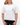 Front of the Wednesday T-Shirt on a female model in front of a white background.