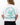 Back of the Wednesday T-Shirt on a female model in front of a white background.