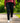 Model wearing the Rhythm Pants outside with greenery in the background