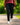 Model wearing the Rhythm Pants outside with greenery in the background